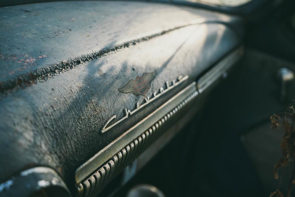 Free Image of Close Up of Emblem on Vintage Car 