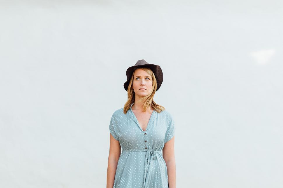 Free Image of Woman in Blue Dress and Hat 