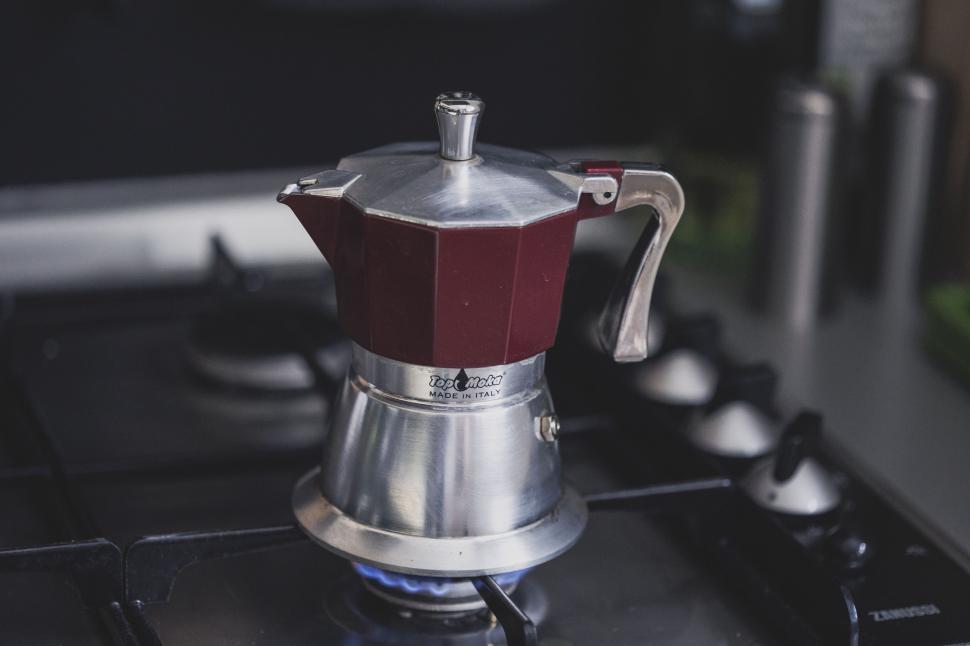 Free Image of Red and Silver Coffee Maker on Stove 
