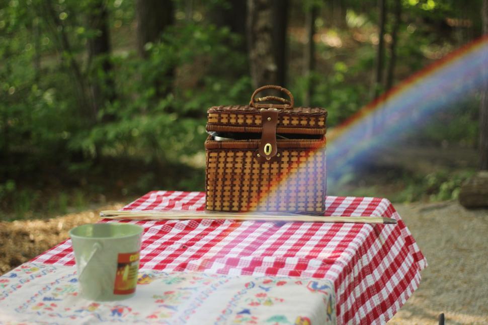 Free Image of A Picnic Table With a Picnic Basket 