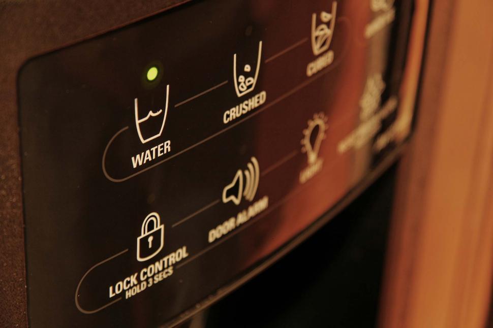 Free Image of Close Up of a Water Dispenser Sign 