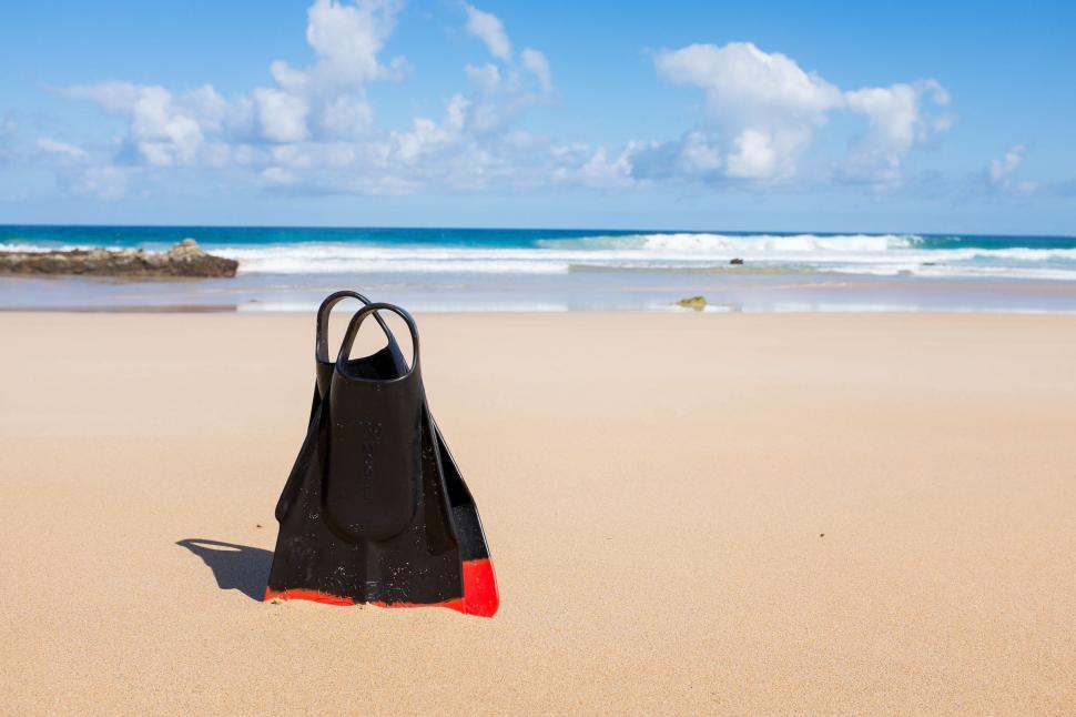 Free Image of Black Bag on Sandy Beach 
