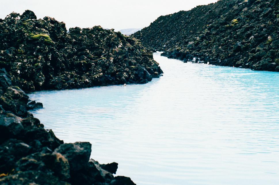 Free Image of Rocky Surroundings of a Vast Water Body 