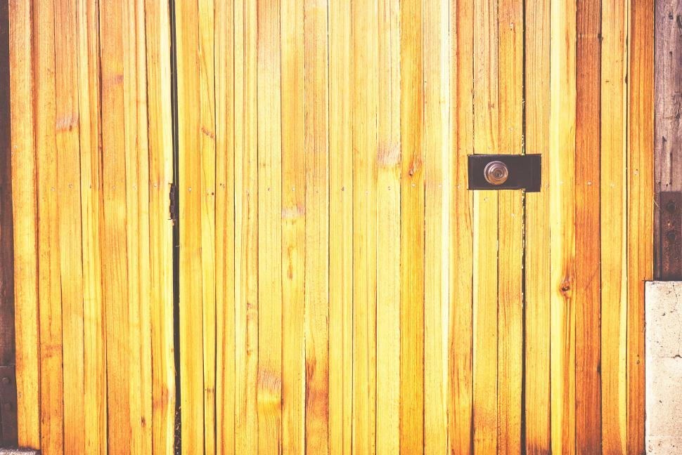 Free Image of Close Up of a Wooden Door on a Building 