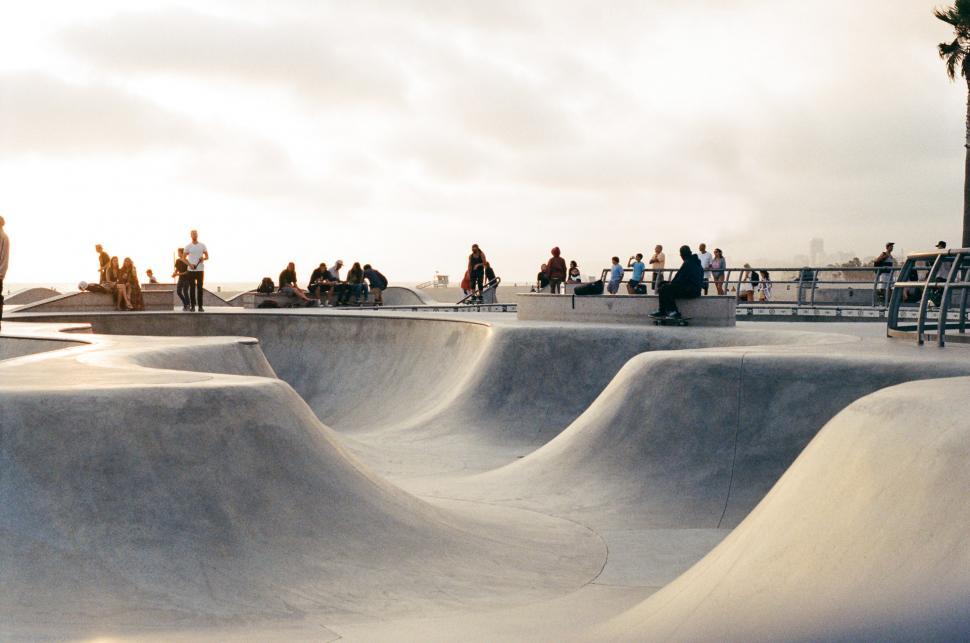 Free Image of Group of People Riding Skateboards at a Skate Park 
