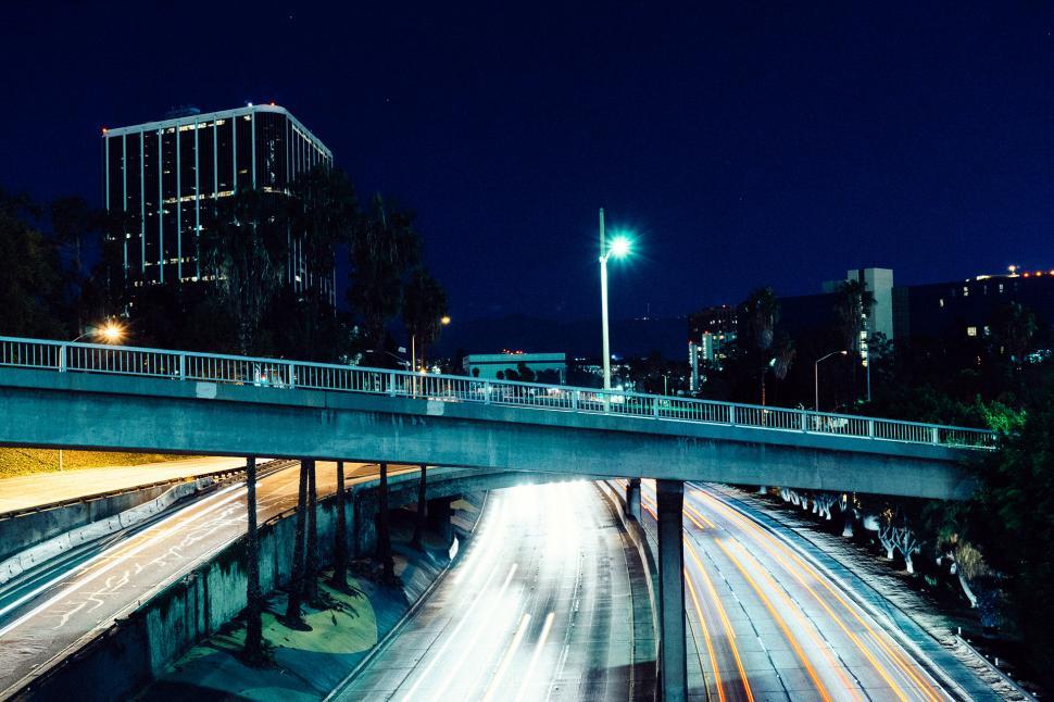 Free Image of City Street With Bridge at Night 