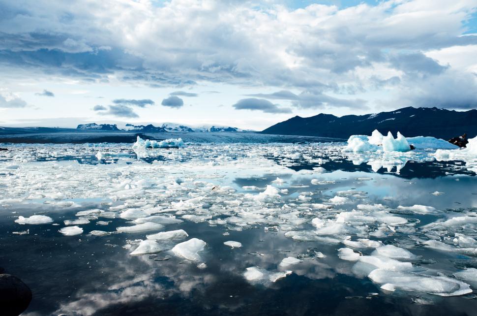 Free Image of Ice Floats on Vast Body of Water 