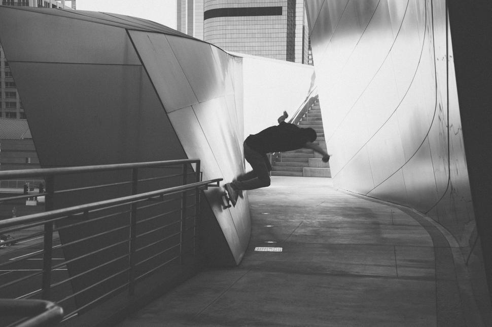Free Image of Skateboarder Performs Trick on Ramp 