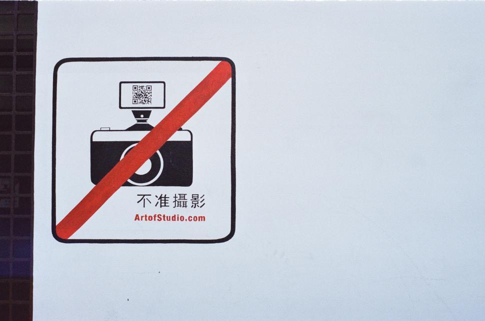 Free Image of Camera Defaced With Red Line 