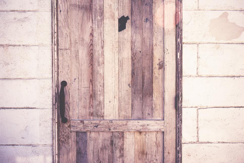 Free Image of Wooden Door With Brick Wall 