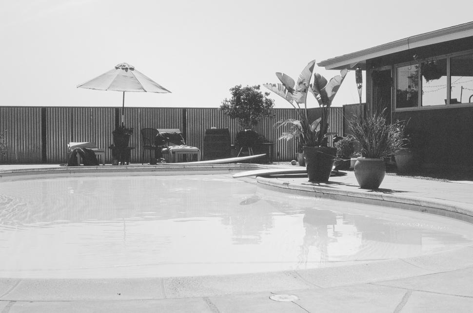 Free Image of Black and White Photo of a Swimming Pool 