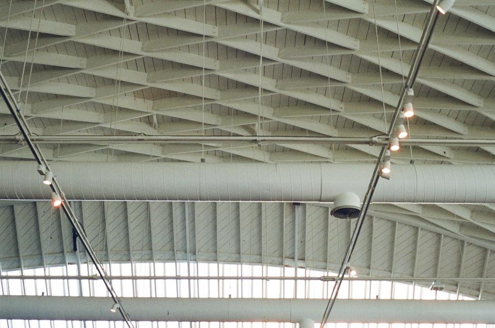 Free Image of Ceiling of Large Building Illuminated by Many Lights 