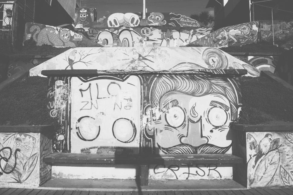 Free Image of Graffiti-Covered Bench in Black and White 