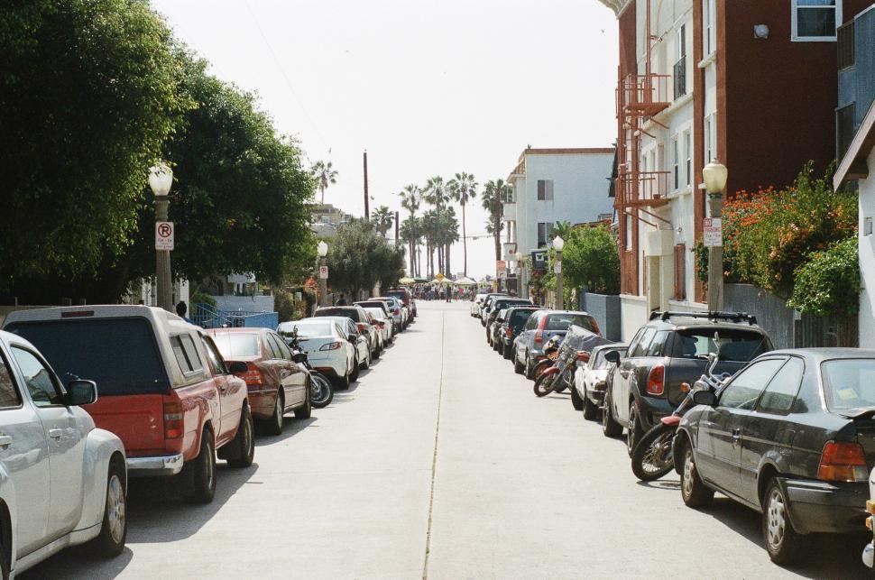 Free Image of Row of Parked Cars on City Street 