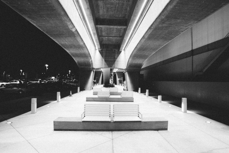 Free Image of Benches Under a Bridge 