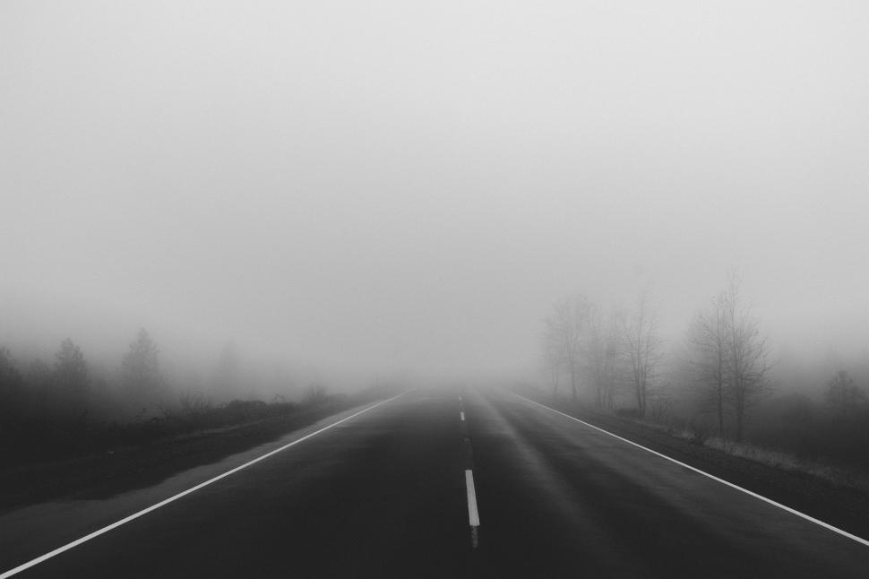 Free Image of Foggy Road Leading Into the Distance 