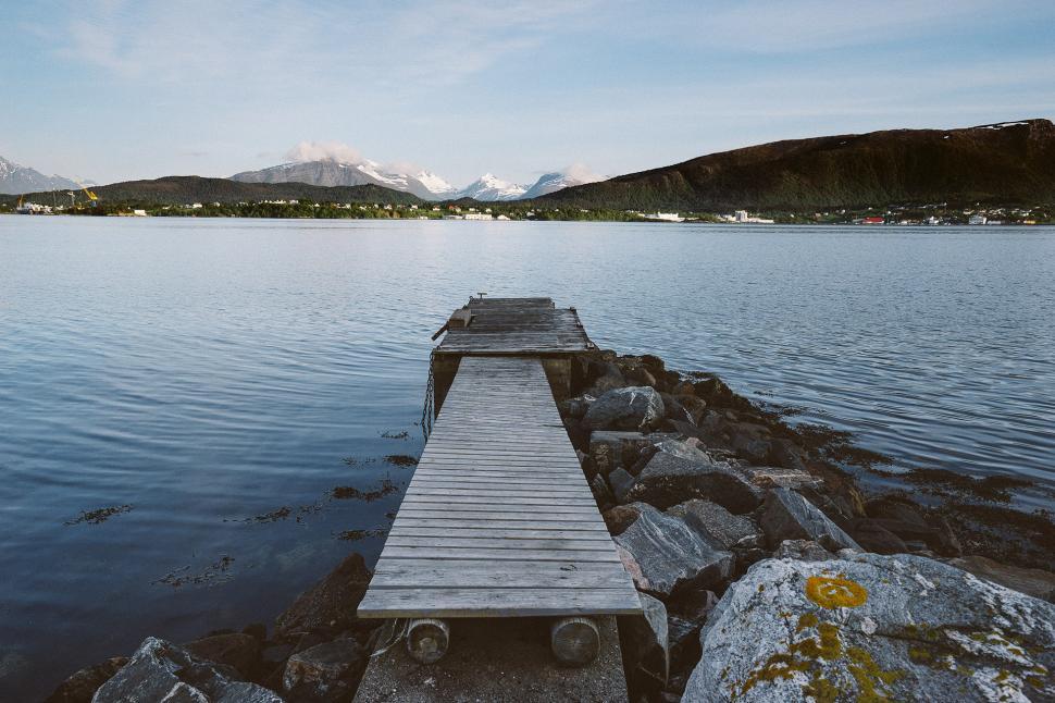 Free Image of Wooden Dock Next to Water 