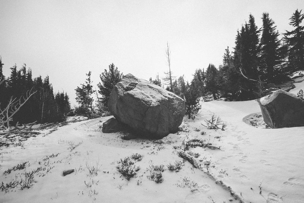 Free Image of Large Rock on Snow-Covered Slope 