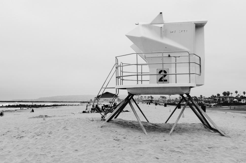 Free Image of Lifeguard Tower on Beach by the Ocean 