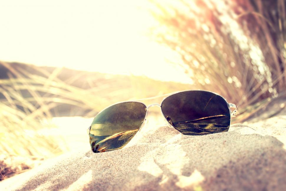 Free Image of Sunglasses on the Sand Dunes - Summer Concept 