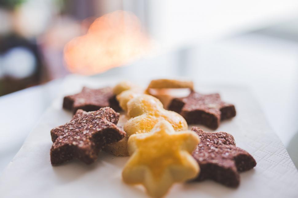 Free Image of White Plate Topped With Star Shaped Cookies 