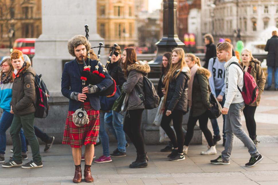 Free Image of Man in a Kilt Playing the Bagpipe 