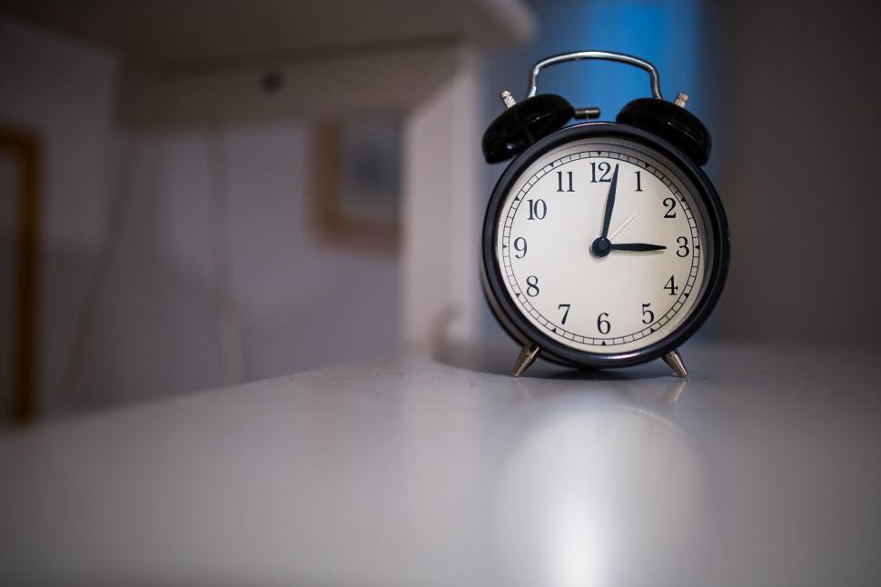 Free Image of Alarm Clock on White Counter 