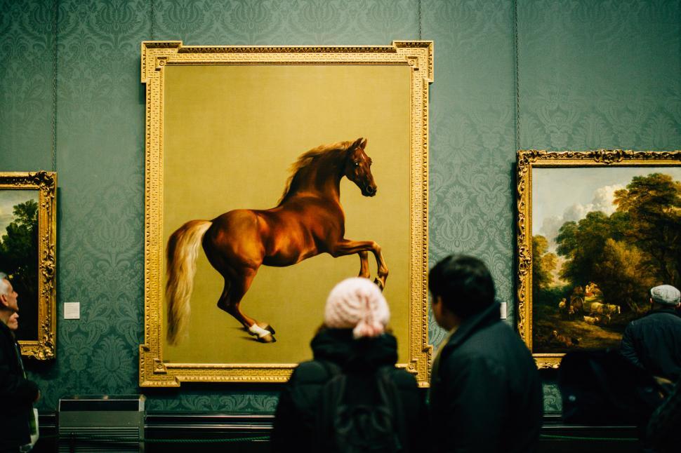 Free Image of Group of People Viewing Painting of Horse 