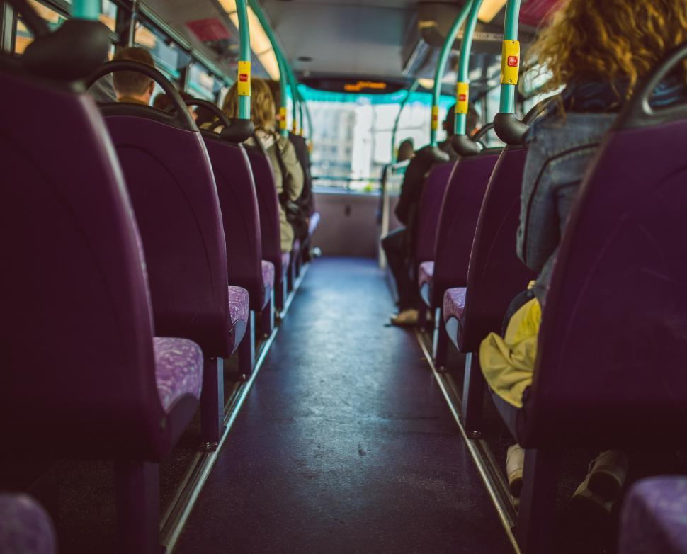 Free Image of Inside of a Bus With Purple Seats 