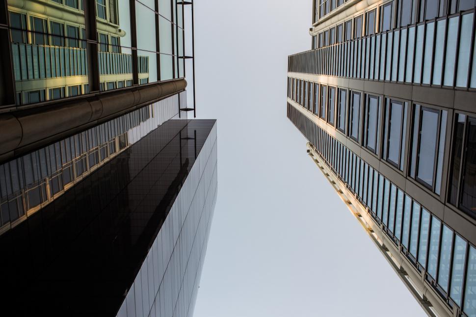 Free Image of Looking Up at Tall Buildings in a City 