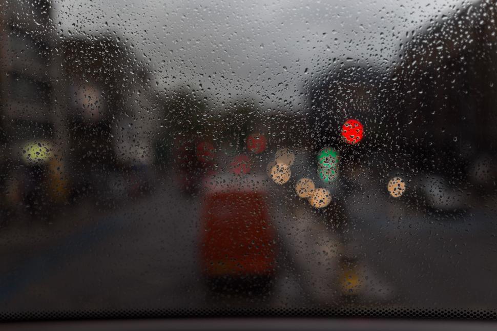 Free Image of Street View Through Rain Covered Window 