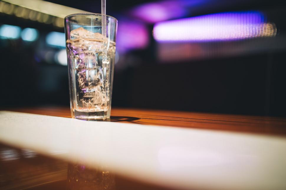 Free Image of A Glass of Water on a Wooden Table 