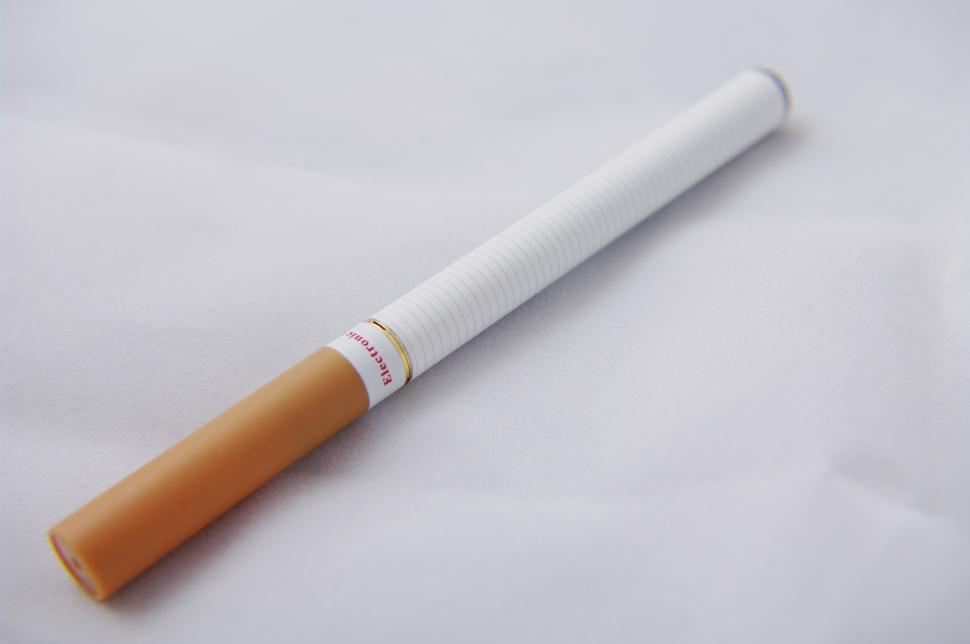 Free Image of Cigarette on White Sheet 