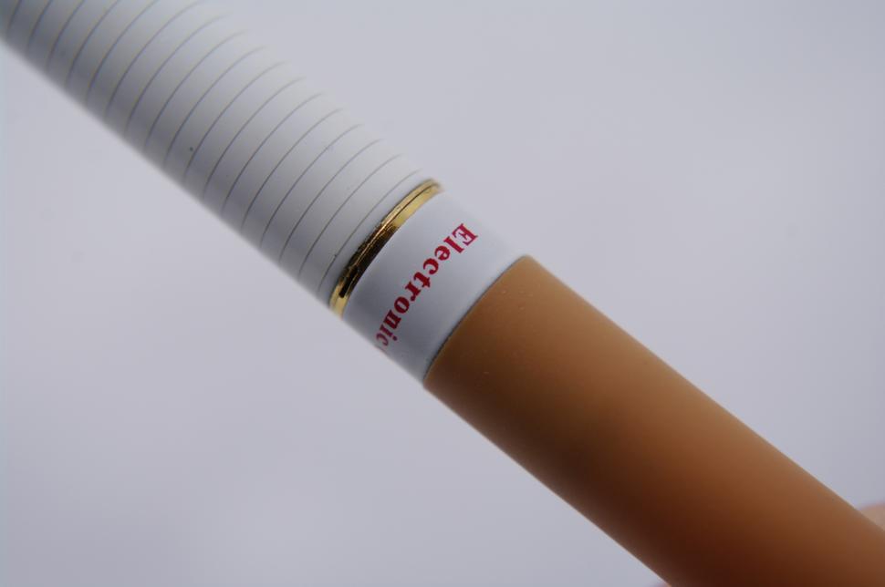 Free Image of Close Up of a Cigarette on White Background 