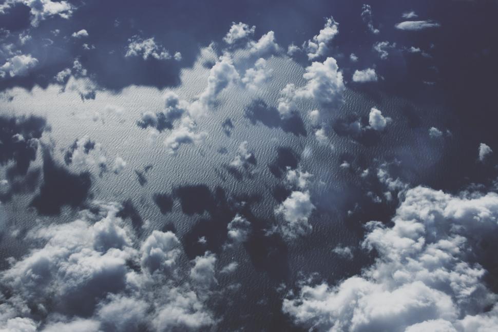 Free Image of Clouds Drifting Over Water 