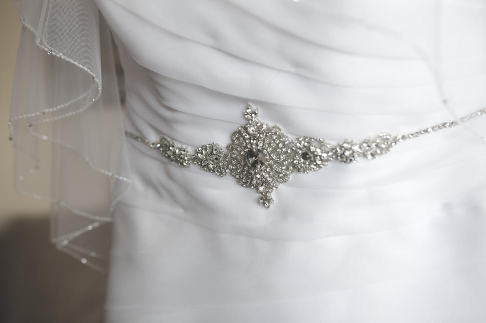 Free Image of Elegant White Dress With Silver Belt 