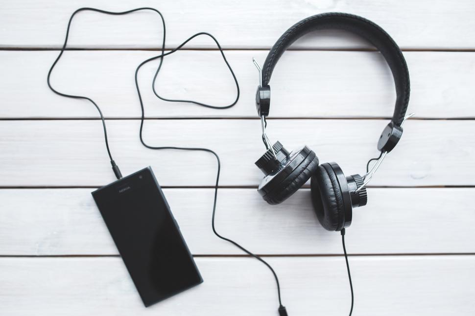 Free Image of Headphones Resting on Wooden Floor 