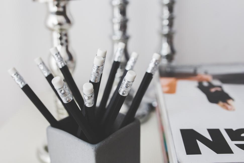 Free Image of A Black and White Photo of a Pen Holder 