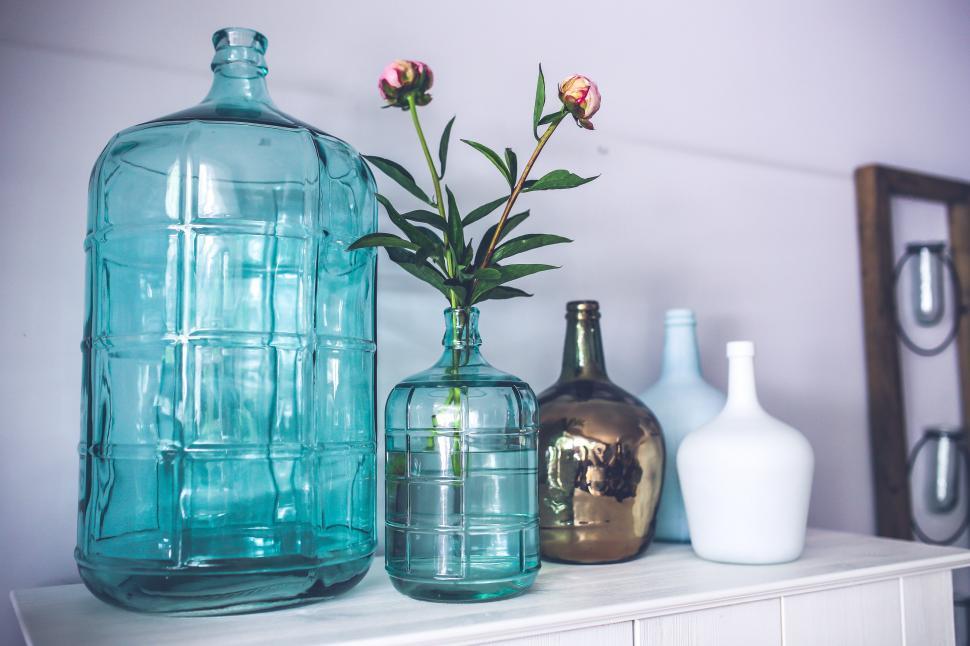 Free Image of Decoration Interior Vase bottles flowers glass modern shelf style trendy container soap dispenser dispenser bottle jar vessel vase glass 