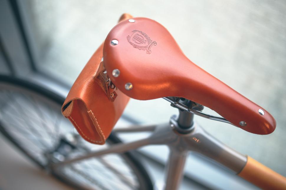 Free Image of Close Up of Bike Handlebar With Bike in Background 