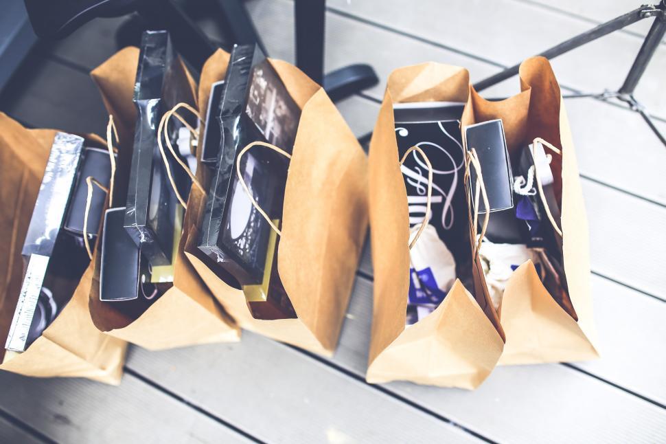 Free Image of Brown Bags Filled With Electronics 