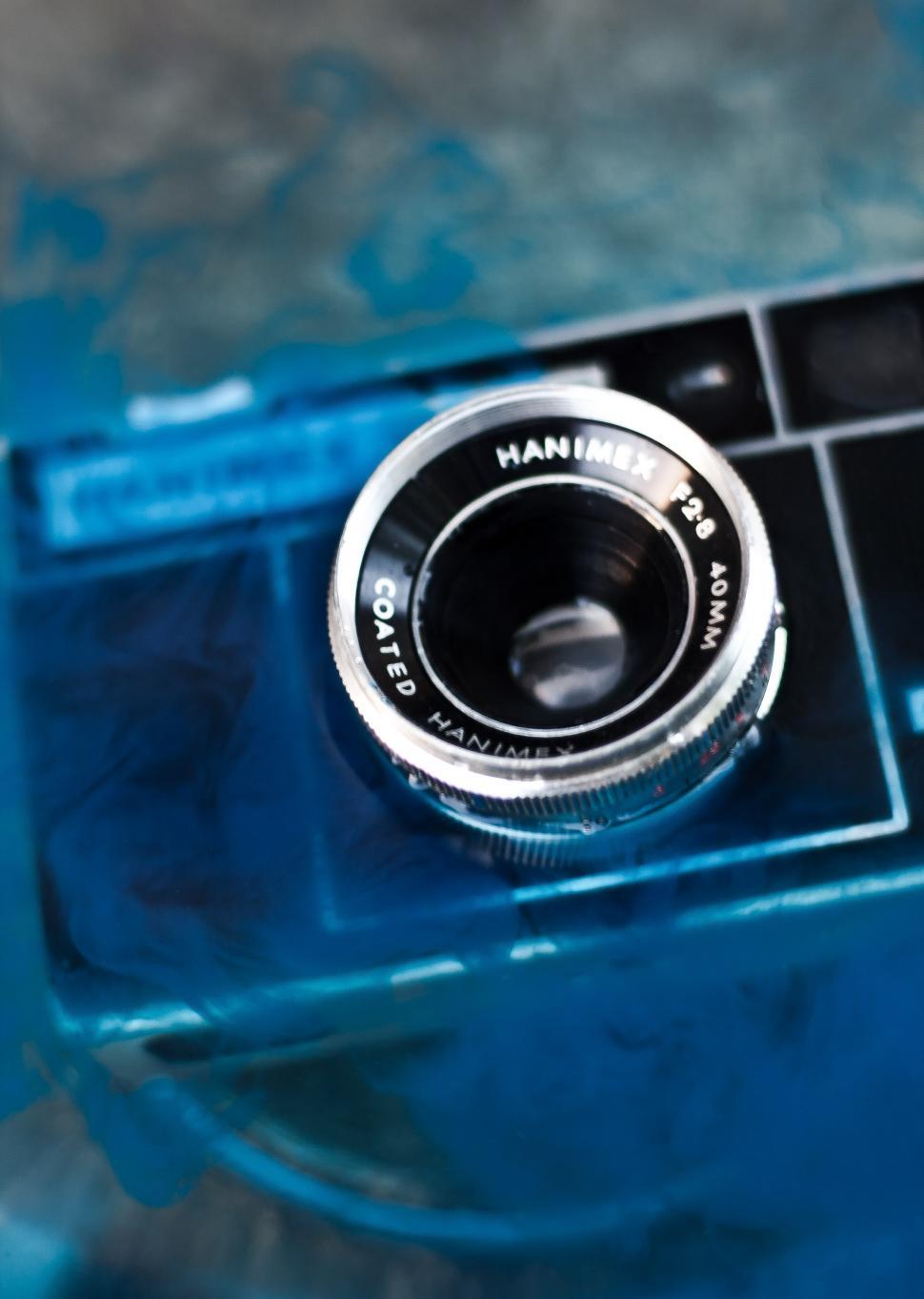 Free Image of Close Up of a Camera on a Table 