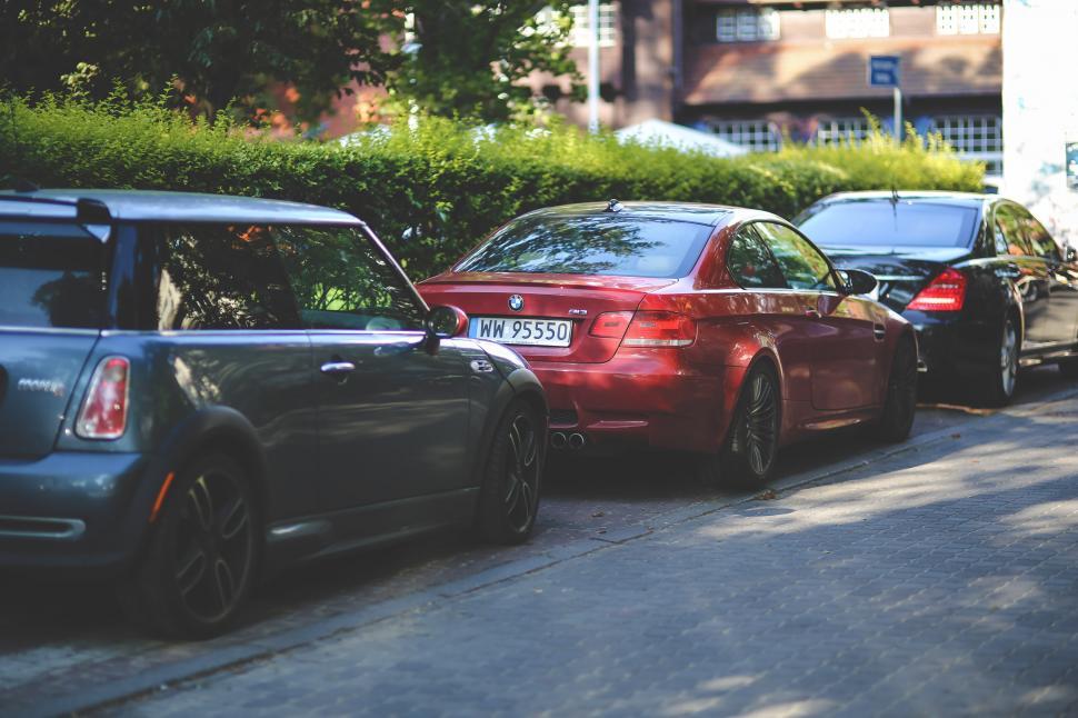 Free Image of Row of Cars Parked Along Road 