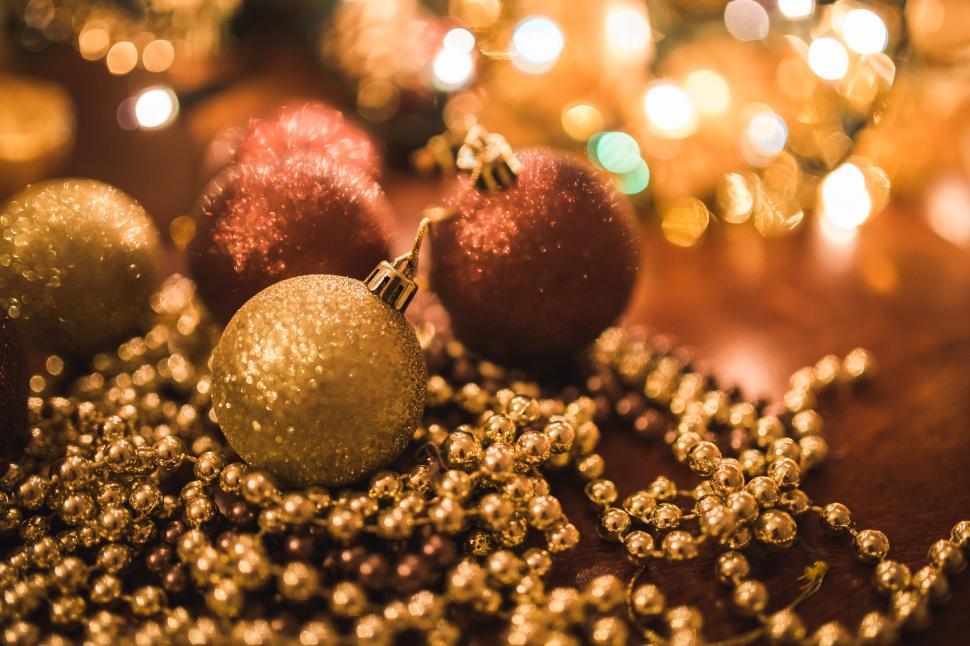 Free Image of Christmas Decor Gold Holiday balls brocade brown glitter golden holidays xmas fruit food acorn berry healthy sweet grape dessert 