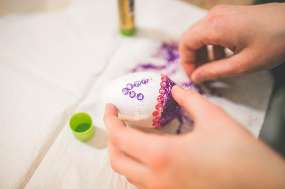 Free Image of Person Decorating a Decorated Rock 