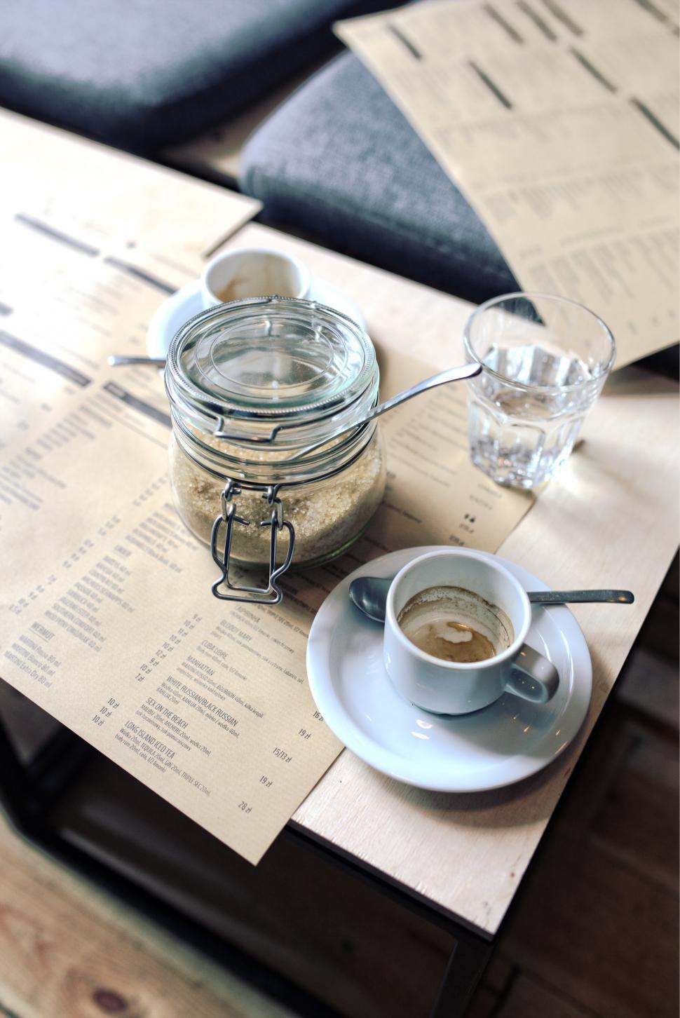 Free Image of Coffee Cup and Jar on Table 