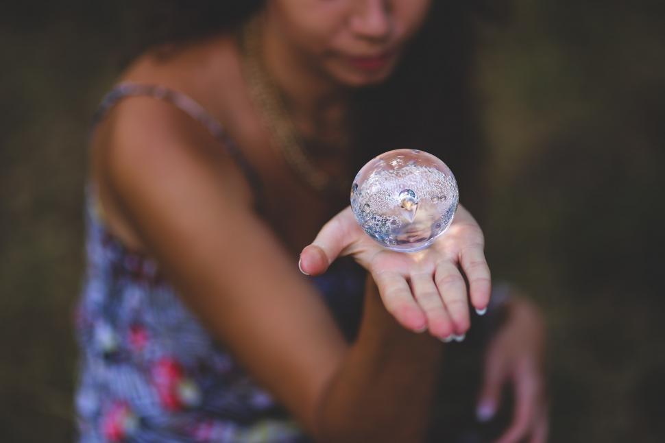 Free Image of Girl Hand Little Small ball crystal glass orb sphere woman people 