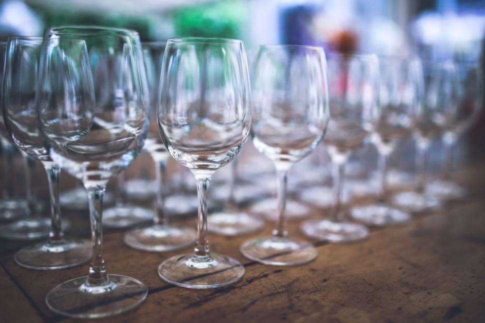 Free Image of Row of Wine Glasses on Wooden Table 