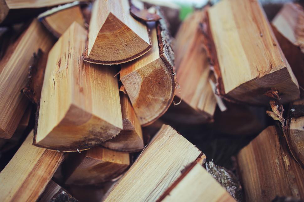 Free Image of Cut Fireplace Wood firewood horizontal logs split stacked tool workshop 