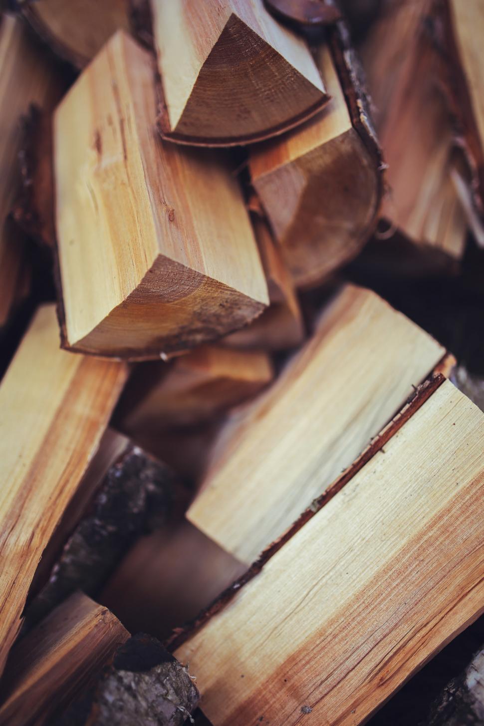 Free Image of Wooden Blocks on Top of a Pile of Wood 